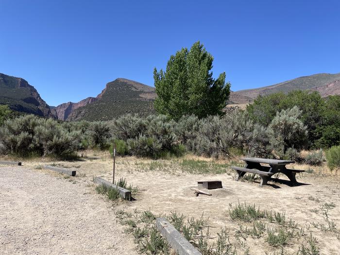 A photo of Site 18 of Loop  at Gates of Lodore Campground with Picnic Table, Fire Pit