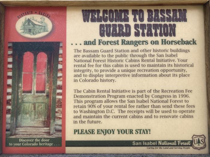 Sign with information about Bassam cabin