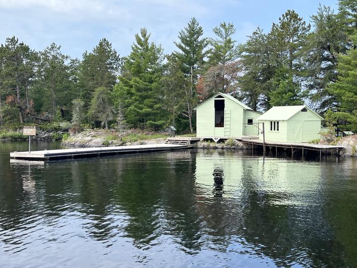 View of Harry Oveseon's Fish Camp with a dock, icehouse, and fish cleaning building on shore.Harry Oveson's Fish Camp