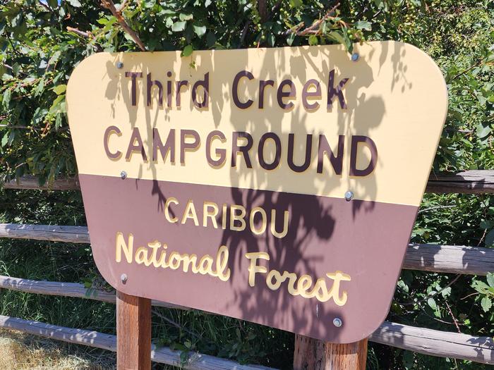 Third Creek Campground SignThird Creek Campground's wooden sign next to the entrance 