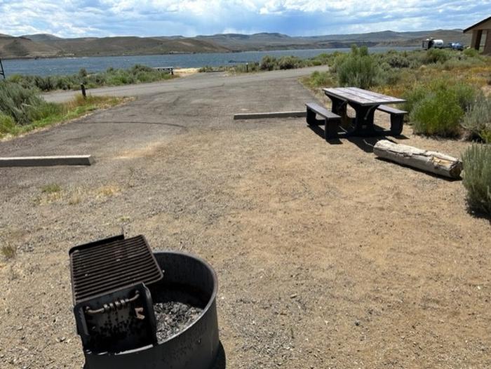 Campsite 8: picnic table, and firepit. Set in sagebrush.Loop A Site 8