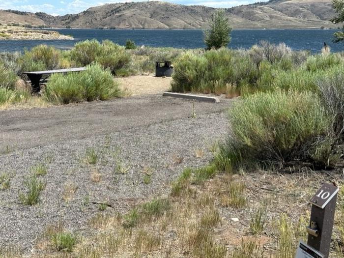 Campsite 10: driveway, picnic table, and firepit. Set in sagebrush with view of mesas and reservoir.Loop A Campsite 10: driveway, picnic table, and firepit. Set in sagebrush with view of mesas and reservoir.