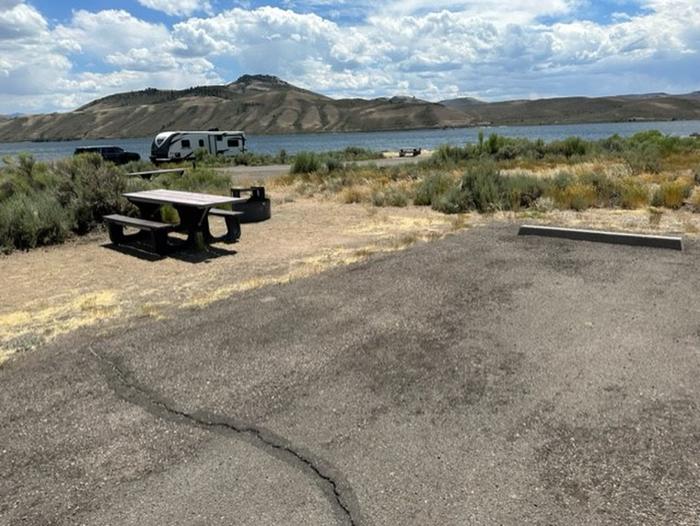 Campsite 13: picnic table, and firepit. Set in sagebrush with view of reservoir.Loop A Campsite 13: picnic table, and firepit.