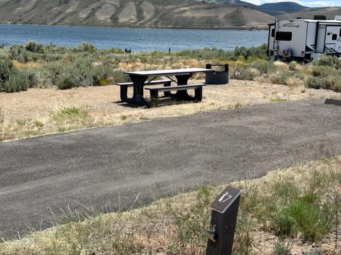Campsite 17: driveway, picnic table, and firepit. Set in sagebrush with view of mesas and reservoir.Loop A Campsite 17: driveway, picnic table, and firepit. Set in sagebrush with view of mesas and reservoir.