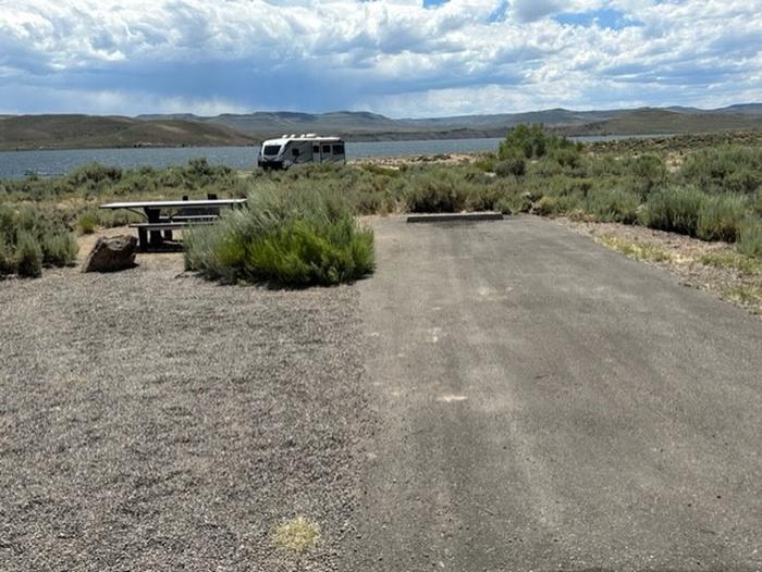 Campsite 19: picnic table and firepit. Set in sagebrush with view of reservoir.Loop A Campsite 19: picnic table and firepit.