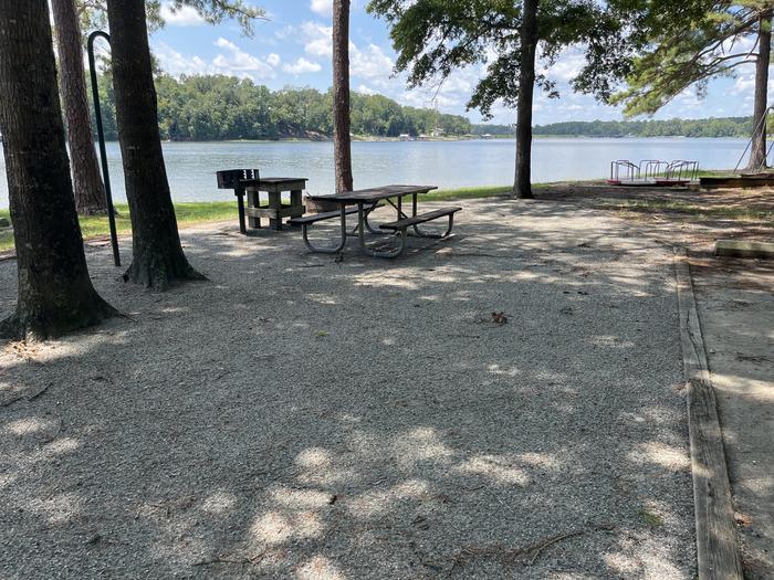 A photo of Site 072 of Loop CVIE at WHITE OAK (CREEK) CAMPGROUND with Picnic Table, Electricity Hookup, Fire Pit, Shade, Tent Pad, Waterfront, Lantern Pole, Water Hookup