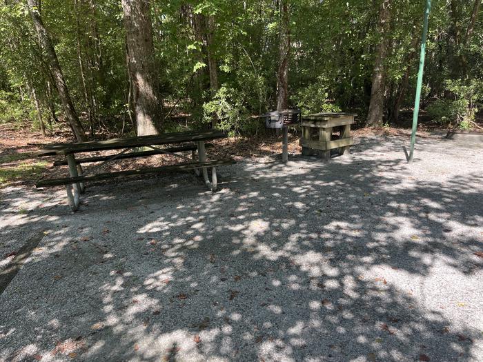 A photo of Site 03 of Loop UTRA at BLUFF CREEK with Picnic Table, Electricity Hookup, Fire Pit, Shade, Lantern Pole, Water Hookup
