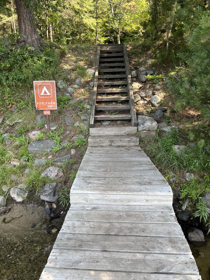 K50 - Fox Farm, stair up to campsite from boat dock with the campsite sign.Stairs to campsite