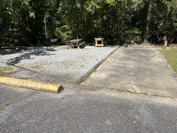 A photo of Site 15 of Loop MRUN at BLUFF CREEK with Picnic Table, Electricity Hookup, Fire Pit, Lantern Pole, Water Hookup