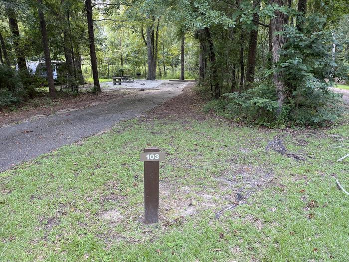 A photo of Site 103 of Loop RCHA at WHITE OAK (CREEK) CAMPGROUND with Picnic Table, Electricity Hookup, Sewer Hookup, Fire Pit, Shade, Tent Pad, Full Hookup, Lantern Pole, Water Hookup