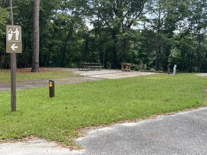 A photo of Site 51 of Loop RFOR at BLUFF CREEK with Picnic Table, Electricity Hookup, Sewer Hookup, Fire Pit, Shade, Tent Pad, Full Hookup, Waterfront, Lantern Pole, Water Hookup