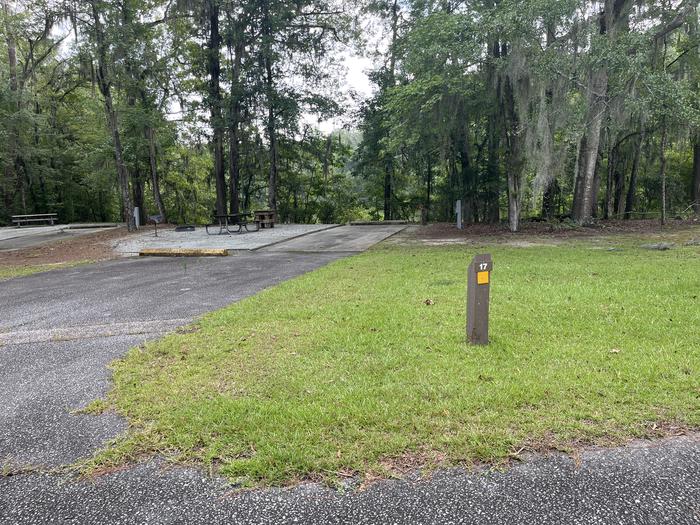A photo of Site 17 of Loop MRUN at BLUFF CREEK with Picnic Table, Electricity Hookup, Sewer Hookup, Fire Pit, Shade, Tent Pad, Full Hookup, Waterfront, Lantern Pole, Water Hookup