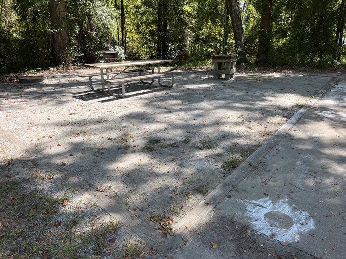 A photo of Site 099 of Loop CVIE at WHITE OAK (CREEK) CAMPGROUND with Picnic Table, Electricity Hookup, Fire Pit, Shade, Lantern Pole, Water Hookup