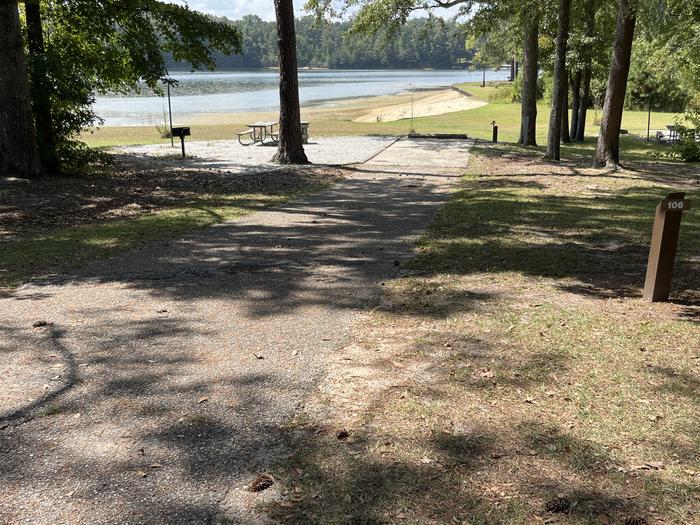 A photo of Site 106 of Loop RCHA at WHITE OAK (CREEK) CAMPGROUND with Picnic Table, Electricity Hookup, Fire Pit, Waterfront, Lantern Pole, Water Hookup