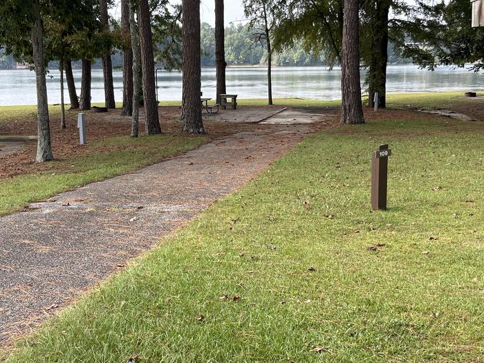 A photo of Site 109 of Loop RCHA at WHITE OAK (CREEK) CAMPGROUND with Picnic Table, Electricity Hookup, Fire Pit, Shade, Waterfront, Water Hookup, Lean To / Shelter