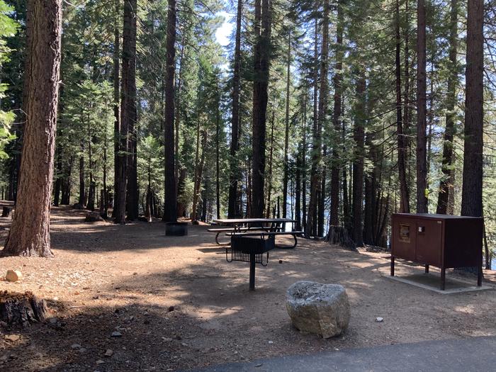 A photo of Site 114 of Loop AREA SUNSET-UNION VALLEY at SUNSET-UNION VALLEY with Picnic Table, Fire Pit, Shade, Food Storage, Tent Pad, Waterfront