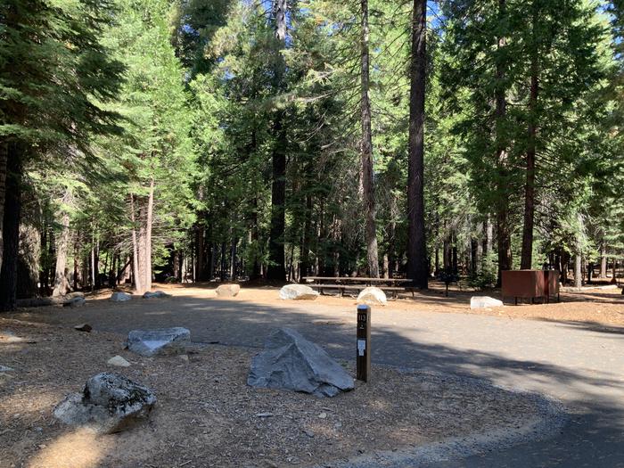 A photo of Site 113 of Loop AREA SUNSET-UNION VALLEY at SUNSET-UNION VALLEY with Picnic Table, Fire Pit, Shade, Food Storage, Tent Pad