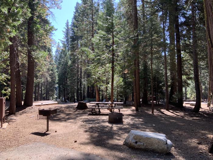 A photo of Site 121 of Loop AREA SUNSET-UNION VALLEY at SUNSET-UNION VALLEY with Picnic Table, Fire Pit, Shade, Food Storage, Tent Pad