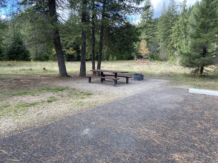 A photo of Site C053 of Loop C at KIT PRICE with Picnic Table, Fire Pit, Shade, Tent Pad