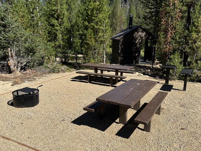 Two picnic table, two utility tables, one fire ringSite 3 picnic area