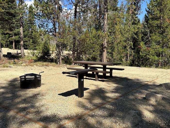 One picnic table, one utility table, one fireringSite 7 picnic site