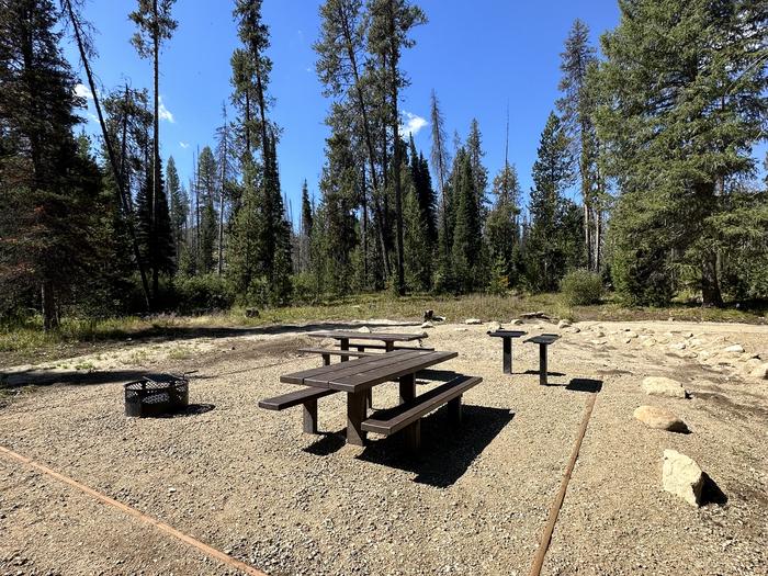 One picnic table, one utility table, one fireringSite 8 picnic area