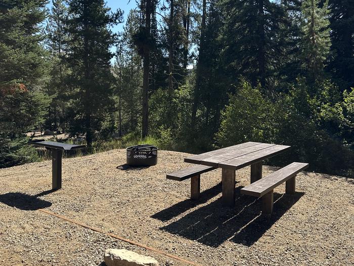 One picnic table, one utility table, one fireringSite 9 picnic area