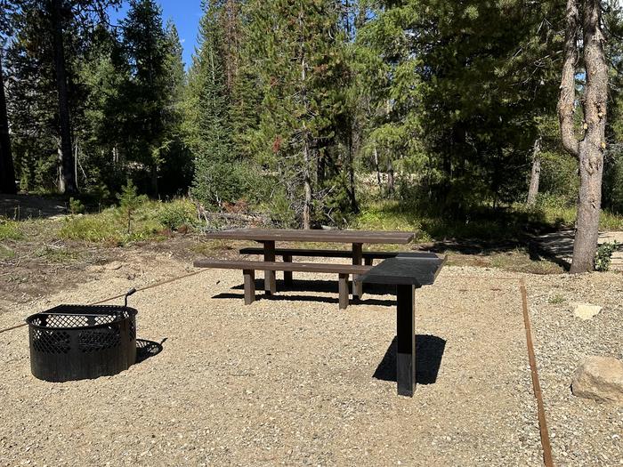 One picnic table, one utility table, one fireringSite 10 picnic area