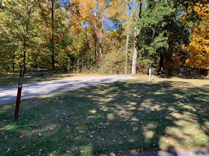This is a full hookup site with all hookups located on the right. The picnic table and fire pit are located on the left side. This site is nestled in the trees providing shade for your site. It is also located near the comfort station and drinking fountain. 