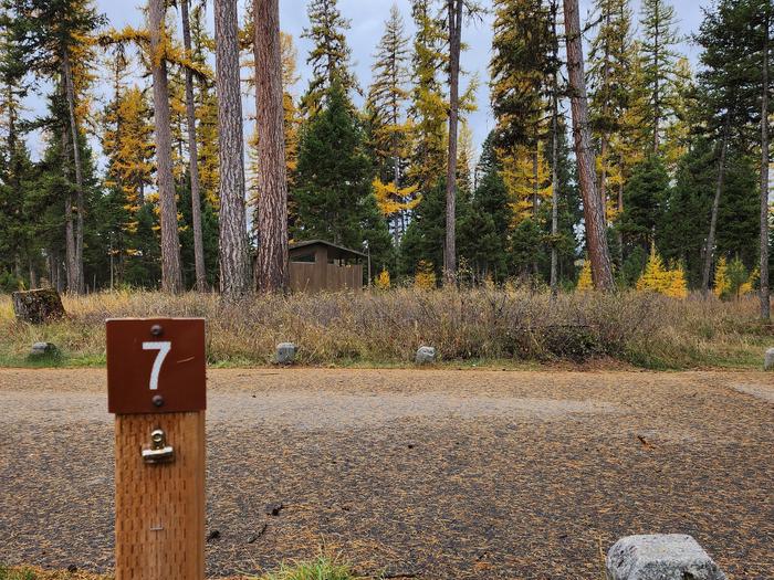 A photo of BLS07 in Loop 1 at Big Larch Campground with campsite marker, parking area.