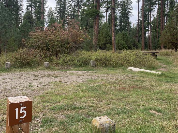A photo of Site BLS15 in Loop 2 at Big Larch Campground with campsite marker, parking area. 