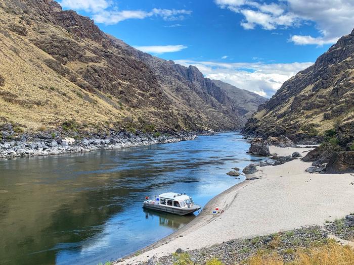 Forest Service on Hells Canyon beach along Snake RiverBoat on beach