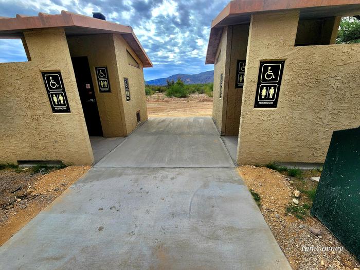 ADA Restroomsnearby restroom facility connected by paved pathway.