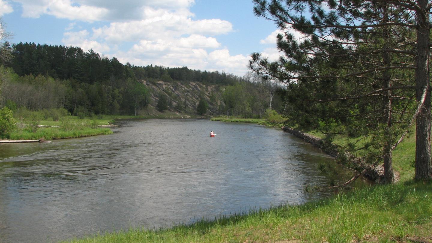 A view of the Au Sable River and Highbanks Overlook from the Gabions Day Use area