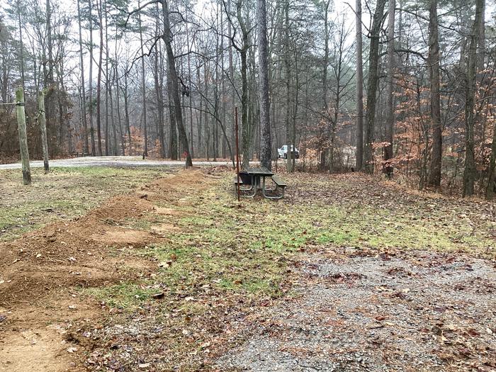 A photo of Site 5 of Loop German Ridge Campground at German Ridge Campground  with Picnic Table, Fire Pit, Shade, Lantern Pole, and Hitching Post.