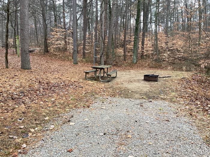 A photo of Site 18 of Loop German Ridge Campground at German Ridge Campground  with Picnic Table, Fire Pit, Shade, Tent Pad, Lantern Pole, and Hitching Post.