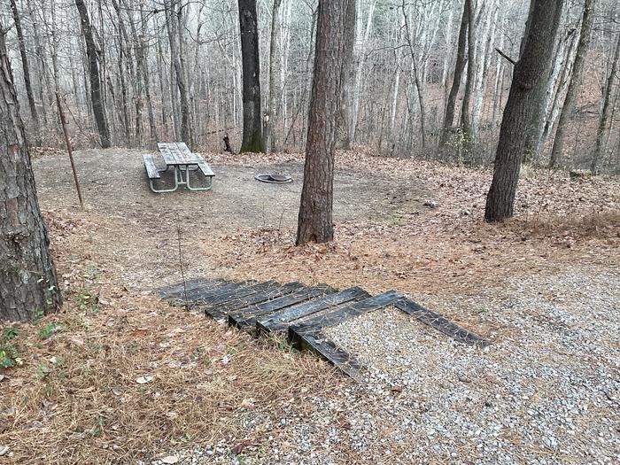 A photo of Site 2 at Saddle Lake Campground with Picnic Table, Fire Pit, Shade, Tent Pad, Lantern Pole