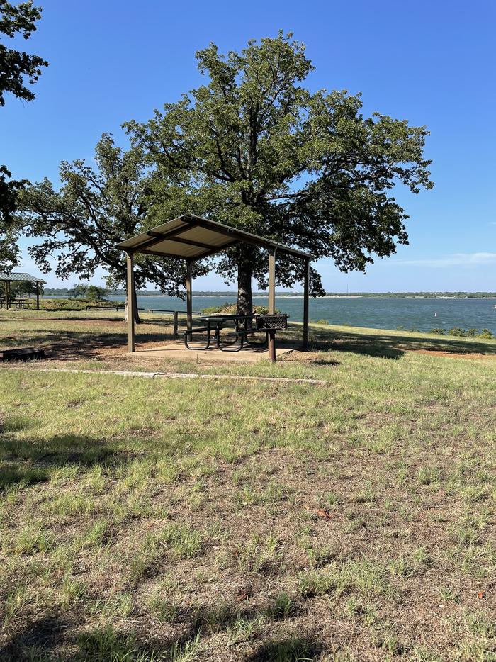 A photo of Site 28 of Loop Hippy Point at MURRELL PARK with Picnic Table, Fire Pit, Shade