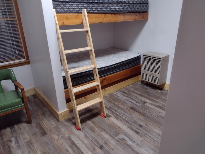 Bunkbeds, ladder, chair and heater1 of 2 rooms