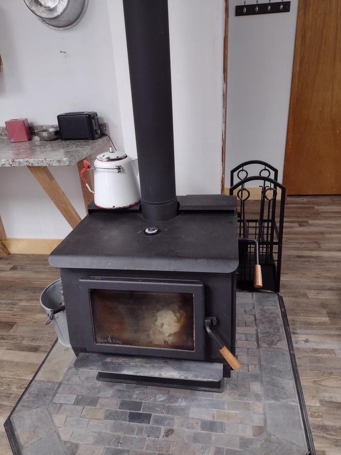 Wood stove with kettle on topWood stove