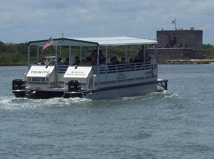 NPS ferry carrying passengers up river towards Fort Matanzas