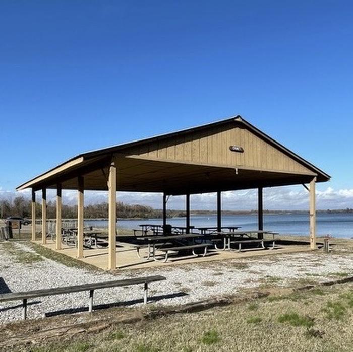 A photo of the Boat Ramp Shelter at Stennis East Bank Day Use (Columbus Lake) with Boat Ramp, Picnic Table, Electricity Hookup, Shade, Waterfront, Water Hookup
