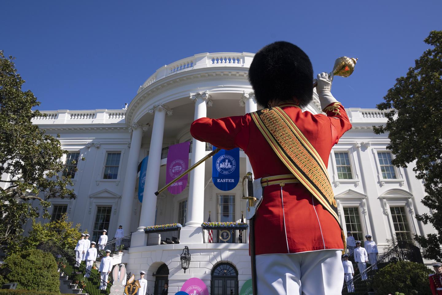 Individual facing white house in uniform as portion of honoring ceremonyA portion of the honoring ceremony during White House Easter Egg Roll