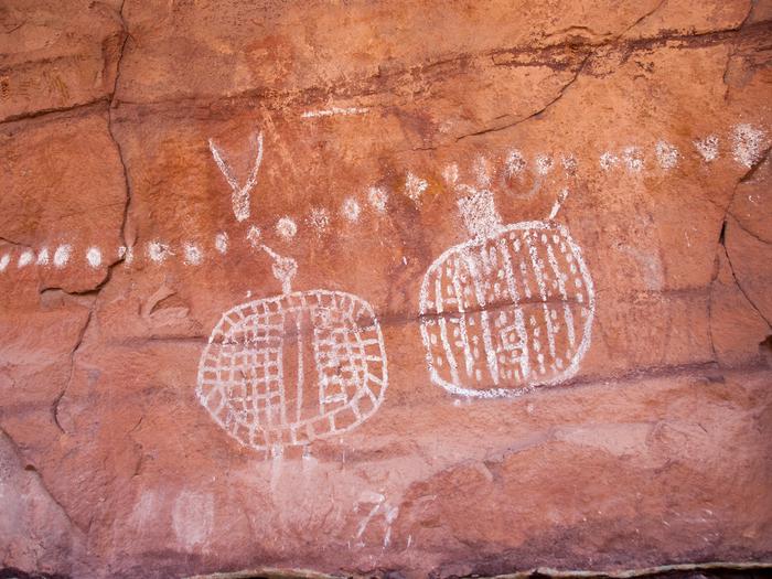 Prehistoric rock markings on red sandstone