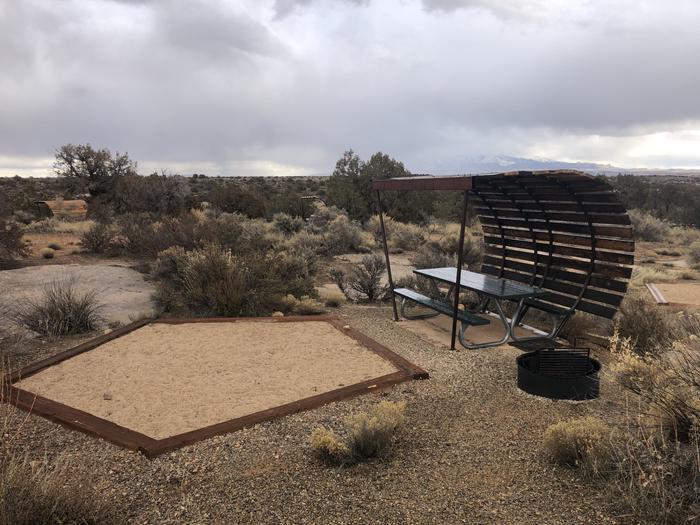 Tent pad, picnic table, and fire ring at Site 3.