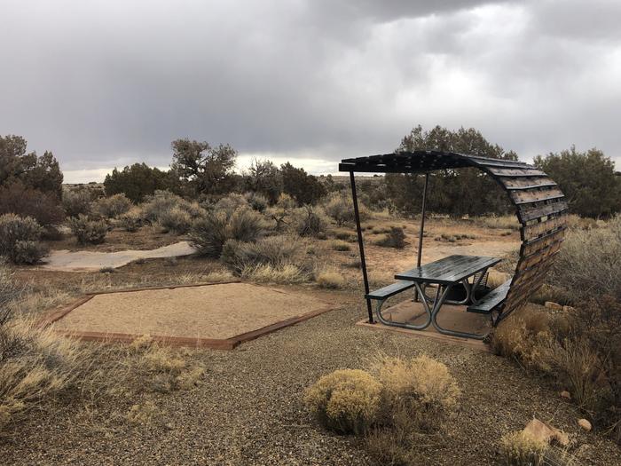 Tent pad, picnic table, and fire ring at Site 5