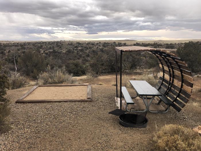 Picnic table, tent pad, and fire ring at Site 6