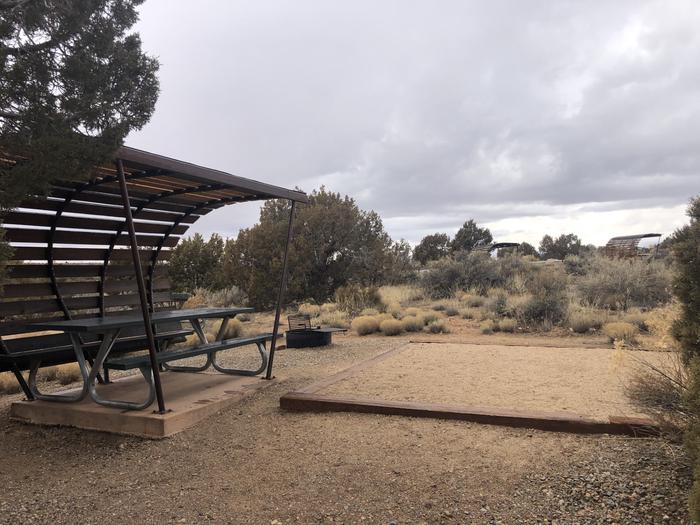 Picnic table, tent pad, and fire ring at Site 9