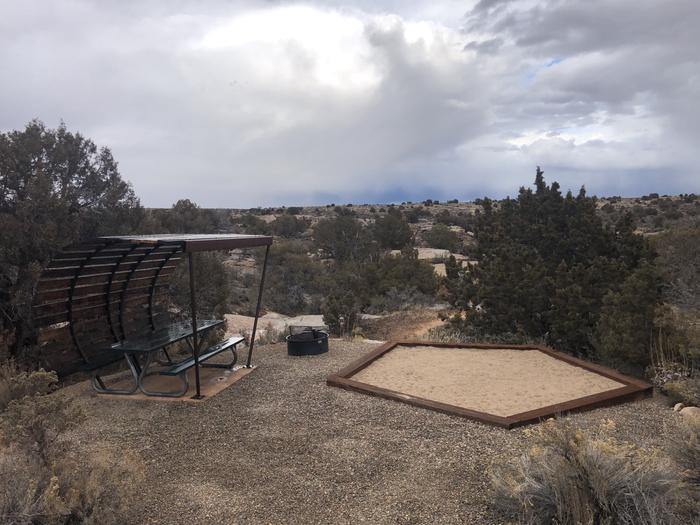 Picnic table, tent pad, and fire ring at Site 21