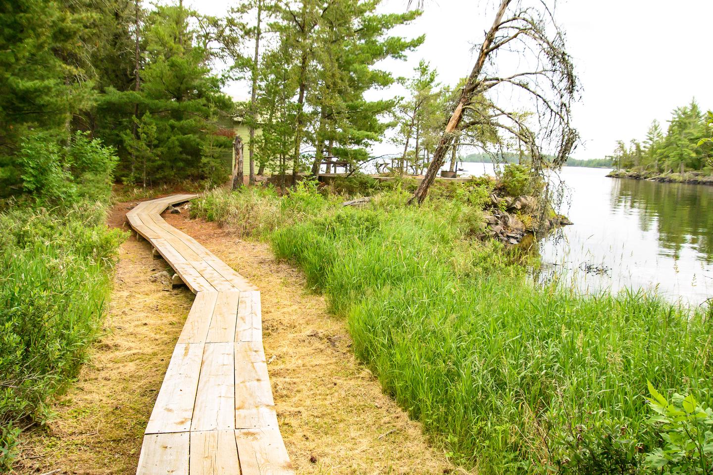 A boardwalk along the shore at Oveson's Fish Camp